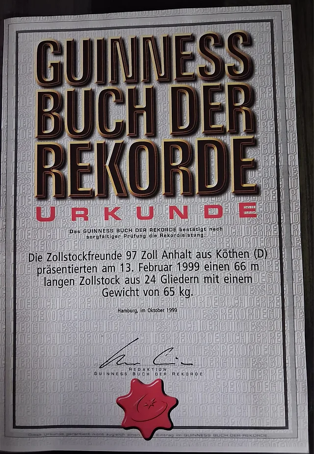 Guinness-Urkunde von 1999 für den Riesenzollstock der Zollstockfreunde 97 Zoll Anhalt